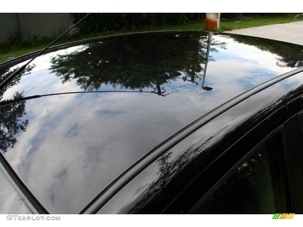 2003 Focus LX Sedan - Pitch Black / Medium Graphite photo #22