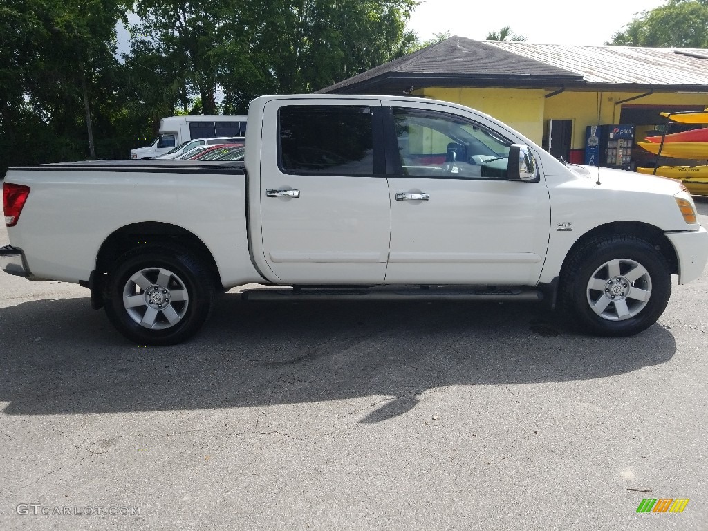 2004 Titan LE Crew Cab 4x4 - White / Sand/Steel photo #2