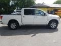 2004 White Nissan Titan LE Crew Cab 4x4  photo #2