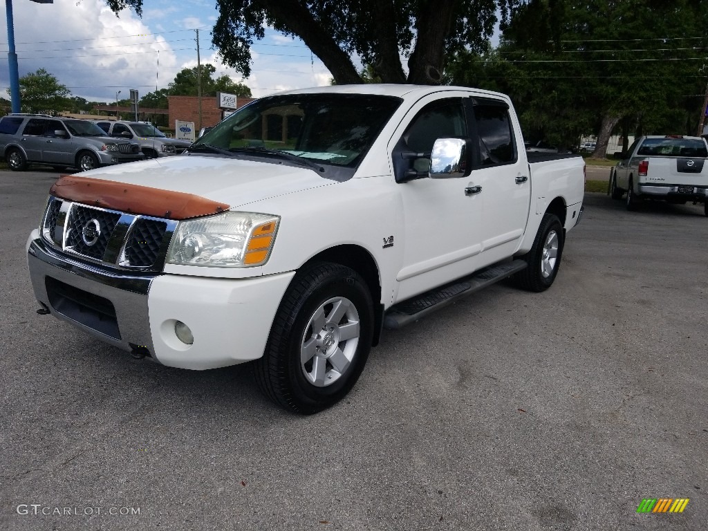 2004 Titan LE Crew Cab 4x4 - White / Sand/Steel photo #7