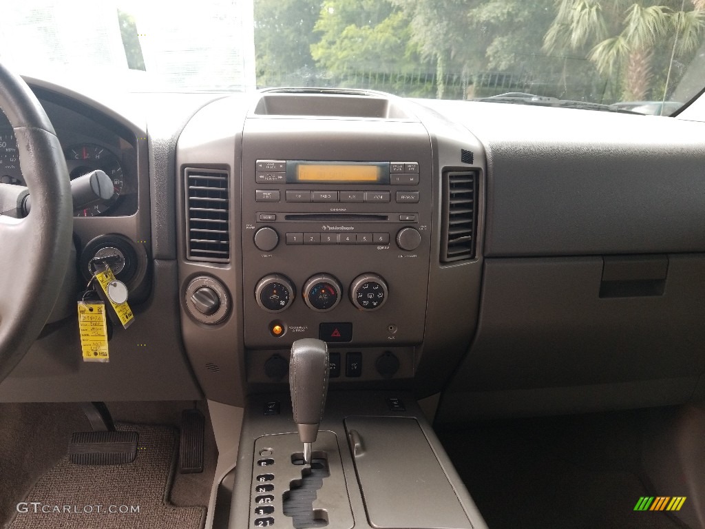 2004 Titan LE Crew Cab 4x4 - White / Sand/Steel photo #15