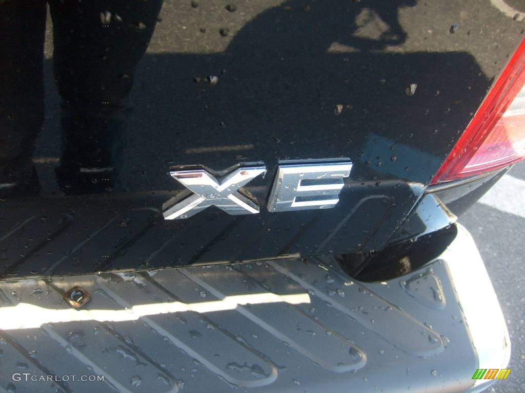 2007 Frontier XE King Cab - Super Black / Steel photo #11