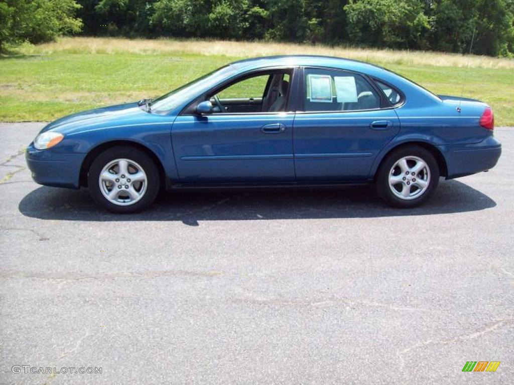 2002 Taurus SE - Medium Royal Blue Metallic / Medium Parchment photo #5