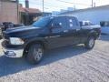 2012 Black Dodge Ram 1500 Outdoorsman Quad Cab 4x4  photo #6