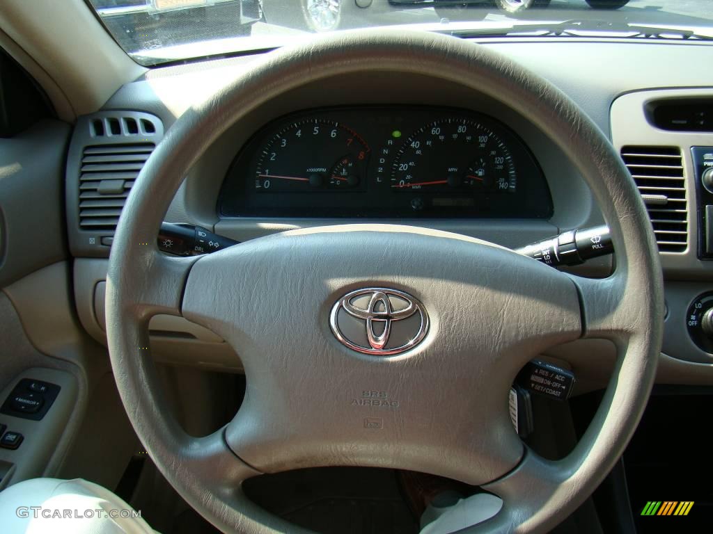 2004 Camry LE - Super White / Taupe photo #18