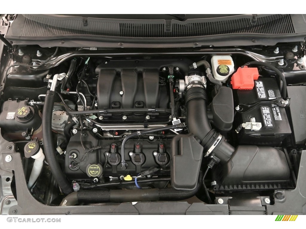 2015 Taurus SEL - Magnetic Metallic / Charcoal Black photo #30