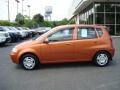 2004 Spicy Orange Chevrolet Aveo LS Hatchback  photo #2