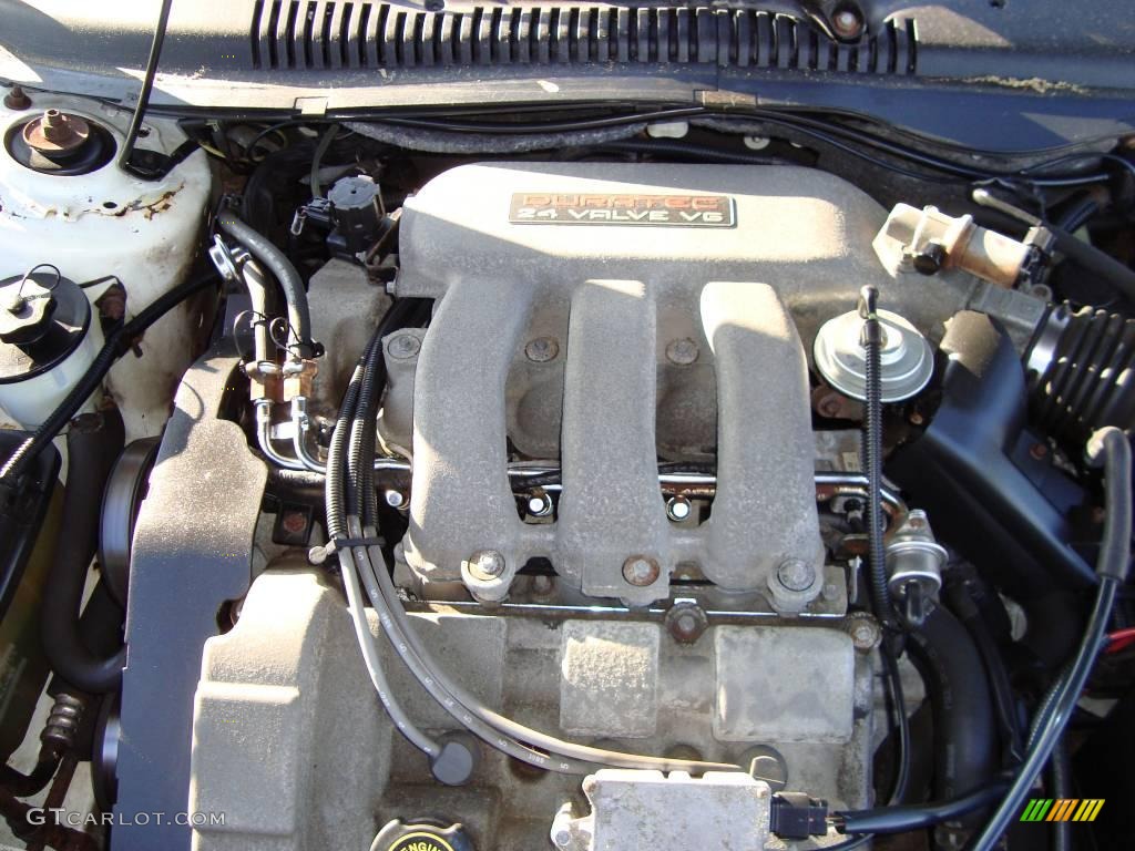 1999 Taurus SE Wagon - Vibrant White / Medium Prairie Tan photo #18