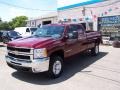 2009 Deep Ruby Metallic Chevrolet Silverado 2500HD LT Extended Cab 4x4  photo #4