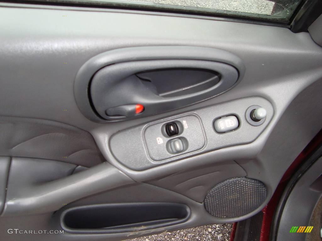 2000 Grand Am SE Sedan - Redfire Metallic / Dark Pewter photo #13