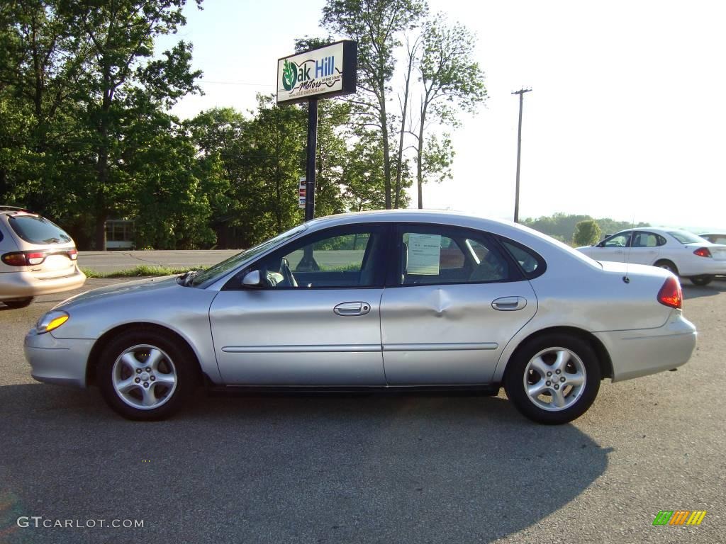 Silver Frost Metallic Ford Taurus