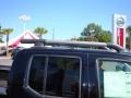 2009 Super Black Nissan Frontier LE Crew Cab  photo #23