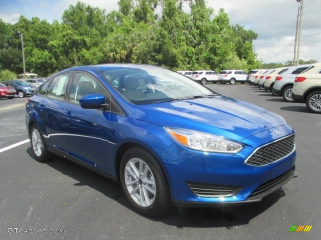 2018 Focus SE Sedan - Lightning Blue / Medium Light Stone photo #1