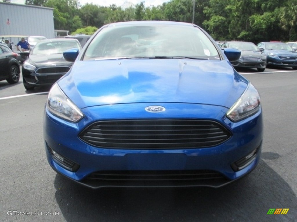 2018 Focus SE Sedan - Lightning Blue / Charcoal Black photo #2