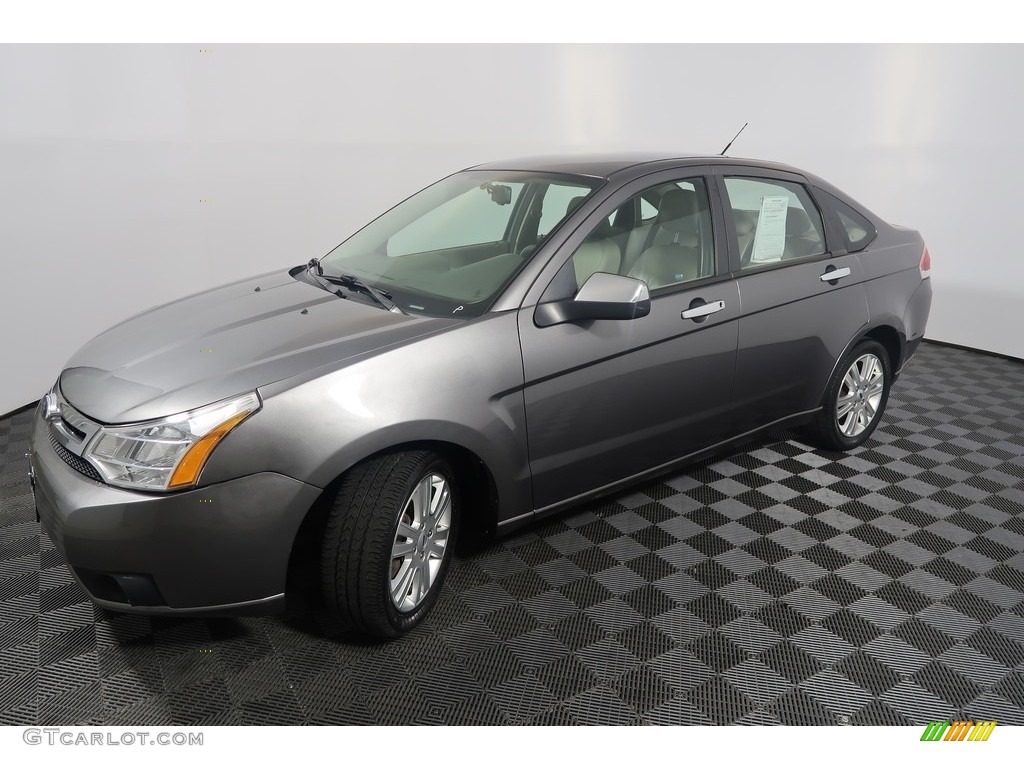 2010 Focus SEL Sedan - Sterling Grey Metallic / Medium Stone photo #7