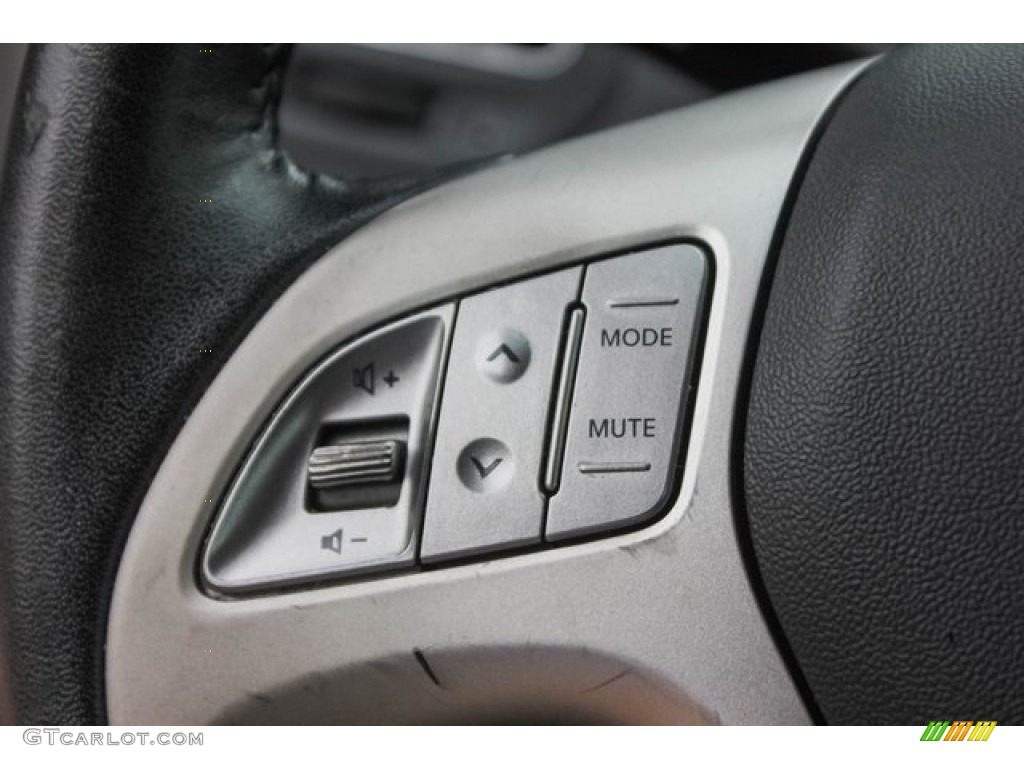 2012 Tucson Limited - Diamond Silver / Black/Saddle photo #33