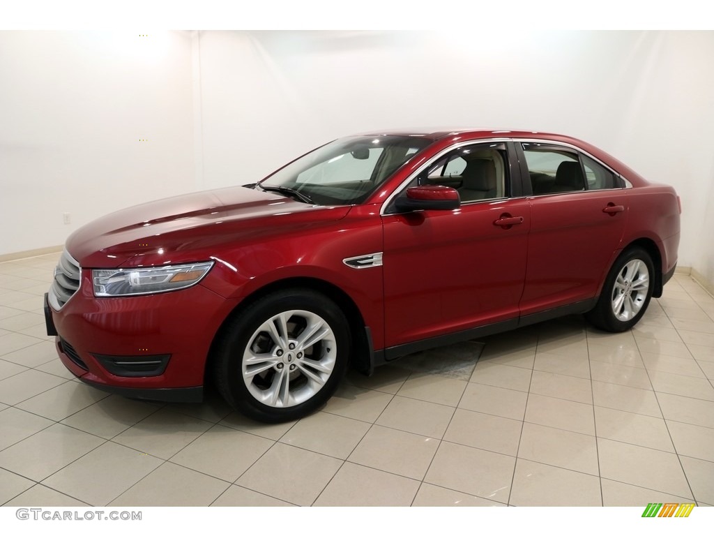 2014 Taurus SEL - Ruby Red / Dune photo #3