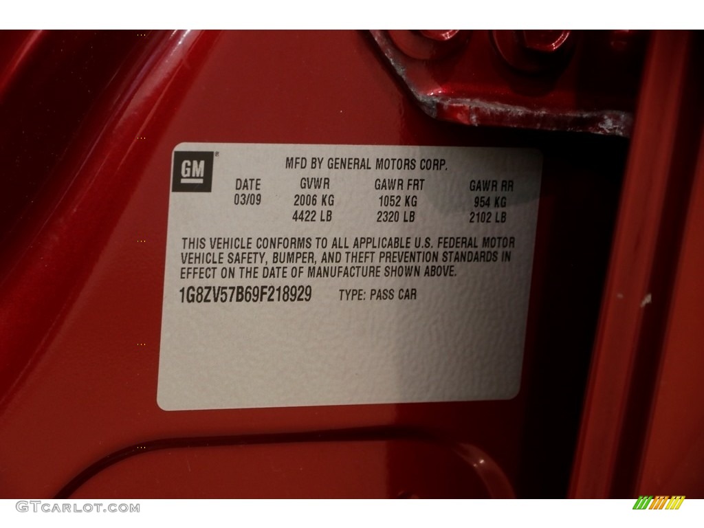 2009 Aura XR - Red Jewel Tintcoat / Black photo #16