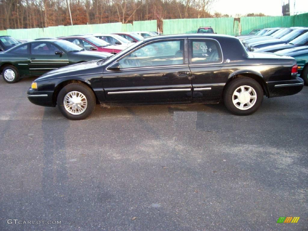 1997 Cougar XR7 - Black / 30th Anniversary Light Prairie Tan photo #1