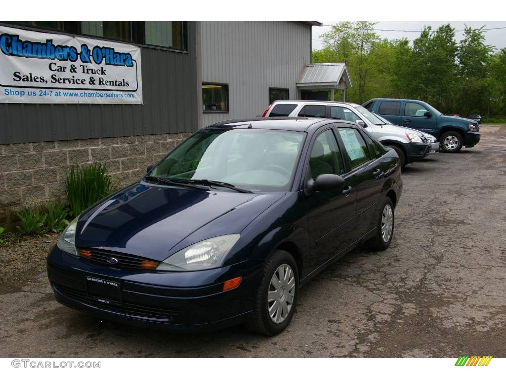 2004 Focus SE Sedan - Twilight Blue Metallic / Medium Parchment photo #1