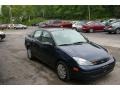 2004 Twilight Blue Metallic Ford Focus SE Sedan  photo #13