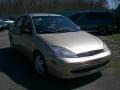 2001 Jackpot Gold Metallic Ford Focus SE Sedan  photo #2