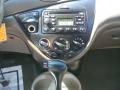 2001 Jackpot Gold Metallic Ford Focus SE Sedan  photo #13