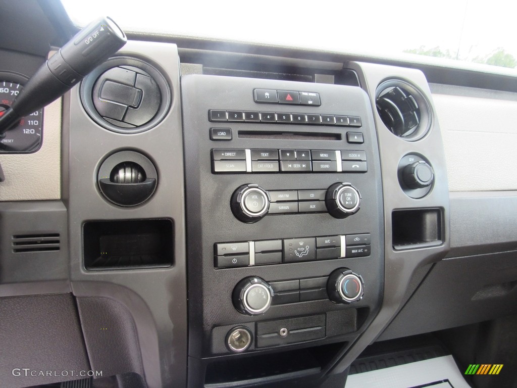 2010 F150 XL Regular Cab - Tuxedo Black / Medium Stone photo #17