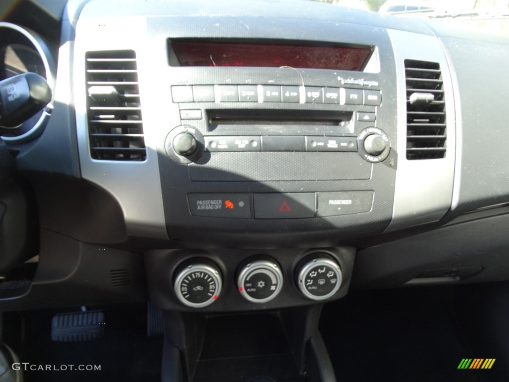 2009 Outlander XLS 4WD - Labrador Black Pearl / Black photo #23