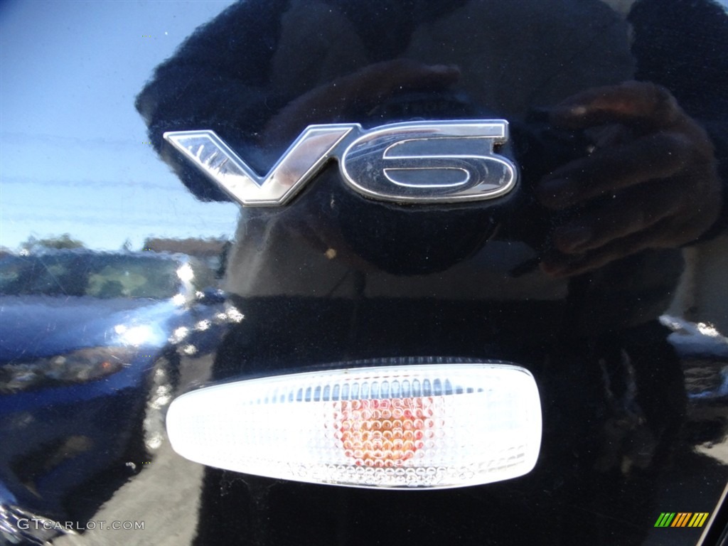 2009 Outlander XLS 4WD - Labrador Black Pearl / Black photo #29