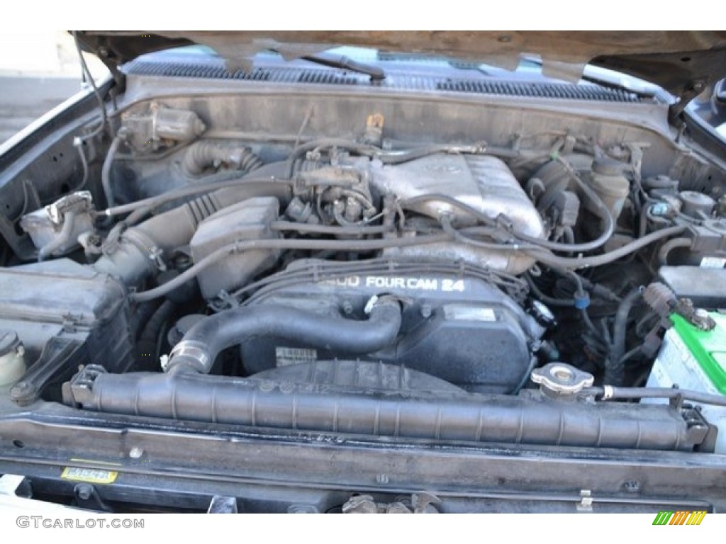 1999 Tacoma V6 Extended Cab 4x4 - Black Metallic / Gray photo #9