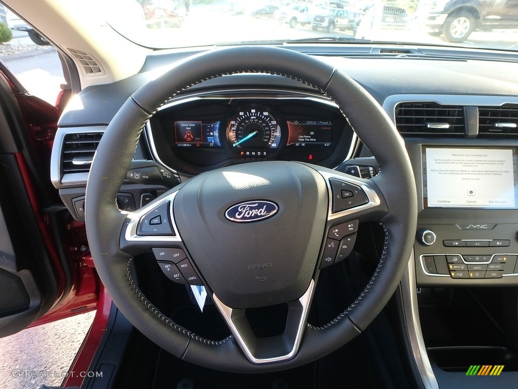 2019 Ford Fusion SE Medium Light Stone Steering Wheel Photo #130076916