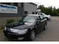 Black Clearcoat - Taurus SEL Photo No. 1
