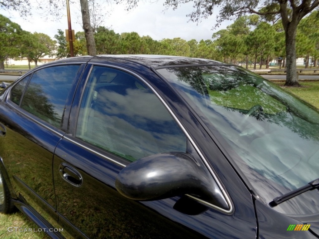2004 Grand Am SE Sedan - Black / Dark Pewter photo #21