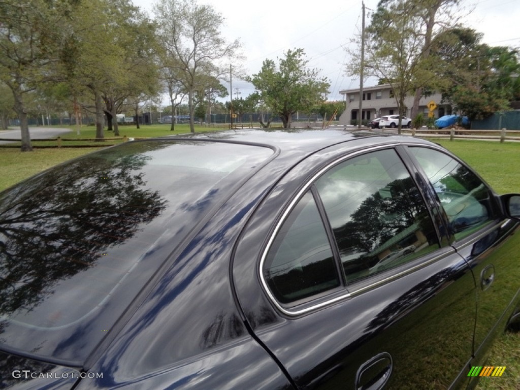 2004 Grand Am SE Sedan - Black / Dark Pewter photo #25