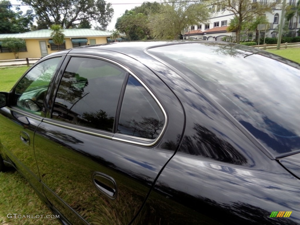 2004 Grand Am SE Sedan - Black / Dark Pewter photo #28