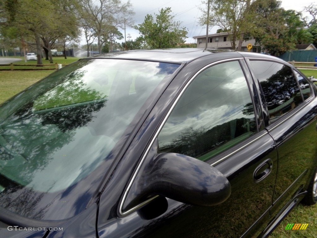 2004 Grand Am SE Sedan - Black / Dark Pewter photo #33