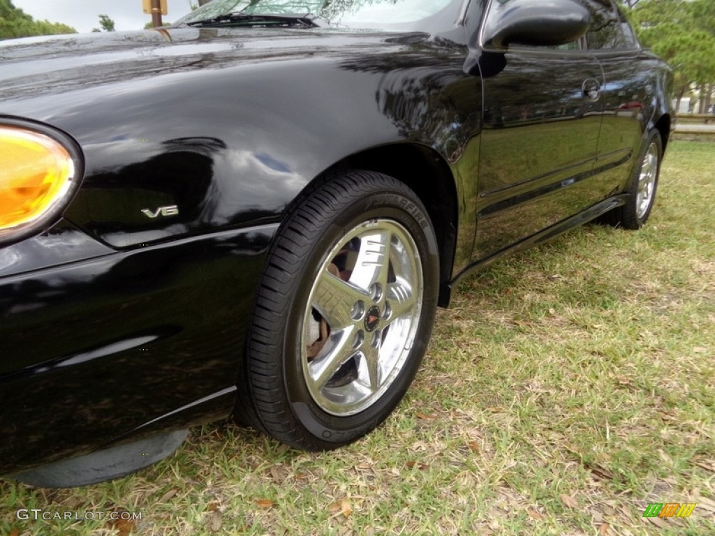 2004 Grand Am SE Sedan - Black / Dark Pewter photo #46