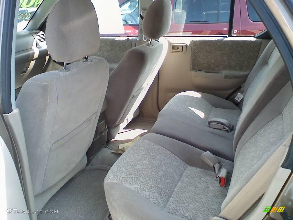 2000 Rodeo LS 4WD - Roman Bronze Metallic / Beige photo #6