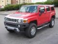 2009 Victory Red Hummer H3   photo #2