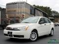 2011 White Suede Ford Focus SE Sedan  photo #1