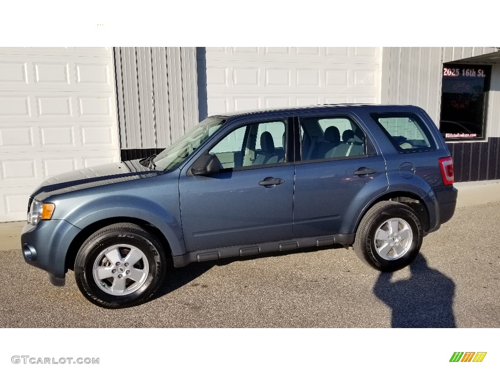 Blue Flame Metallic Ford Escape