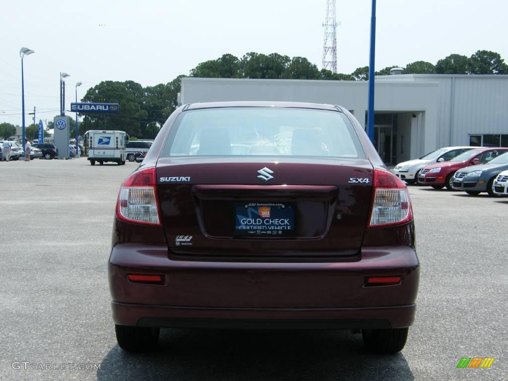 2008 SX4 Sport Sedan - Cherry Red Metallic / Black photo #4