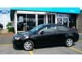 2009 Ebony Black Ford Focus SE Coupe  photo #2