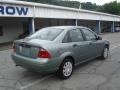 2005 Light Tundra Metallic Ford Focus ZX4 SE Sedan  photo #2