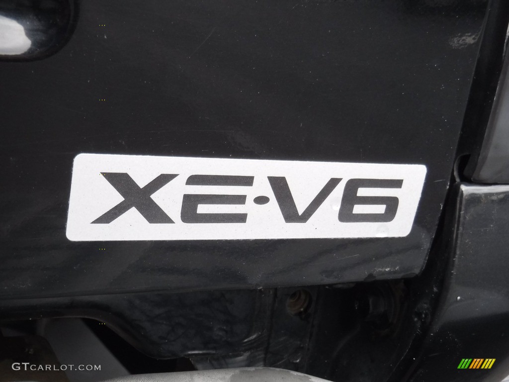 2004 Frontier XE V6 Crew Cab 4x4 - Super Black / Charcoal photo #11