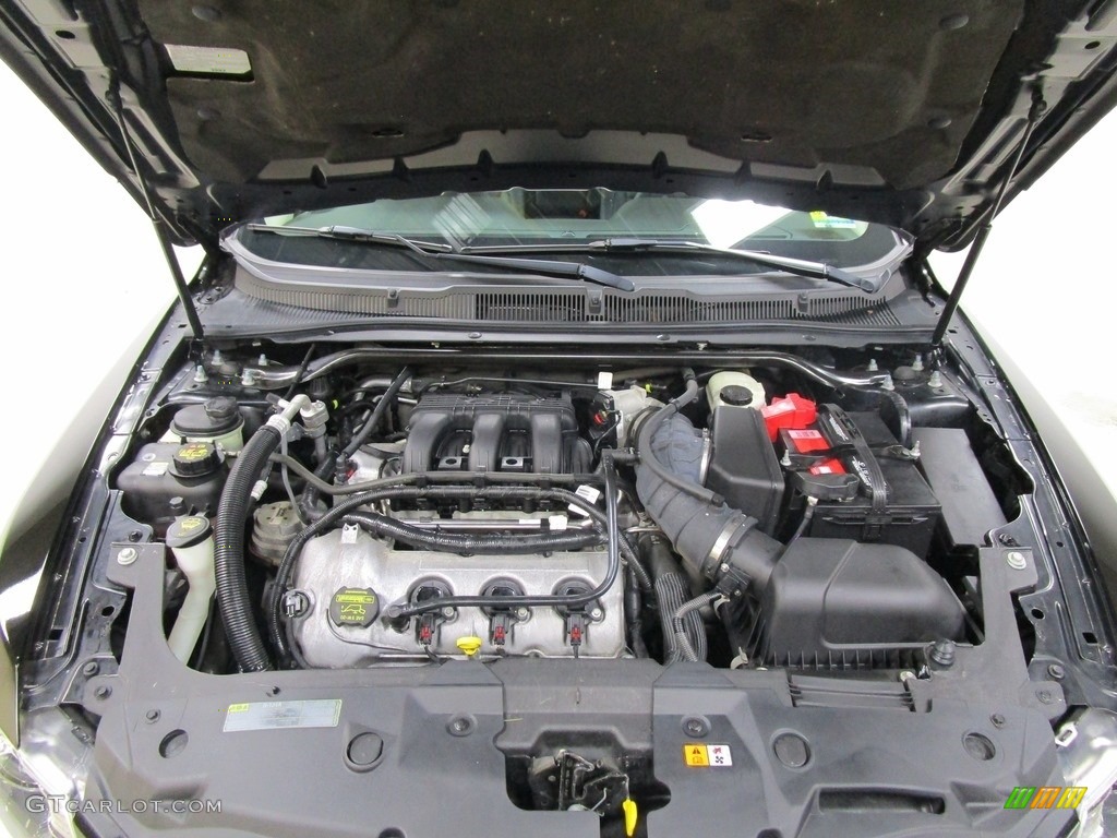 2012 Taurus Limited - Ebony Black / Charcoal Black photo #28