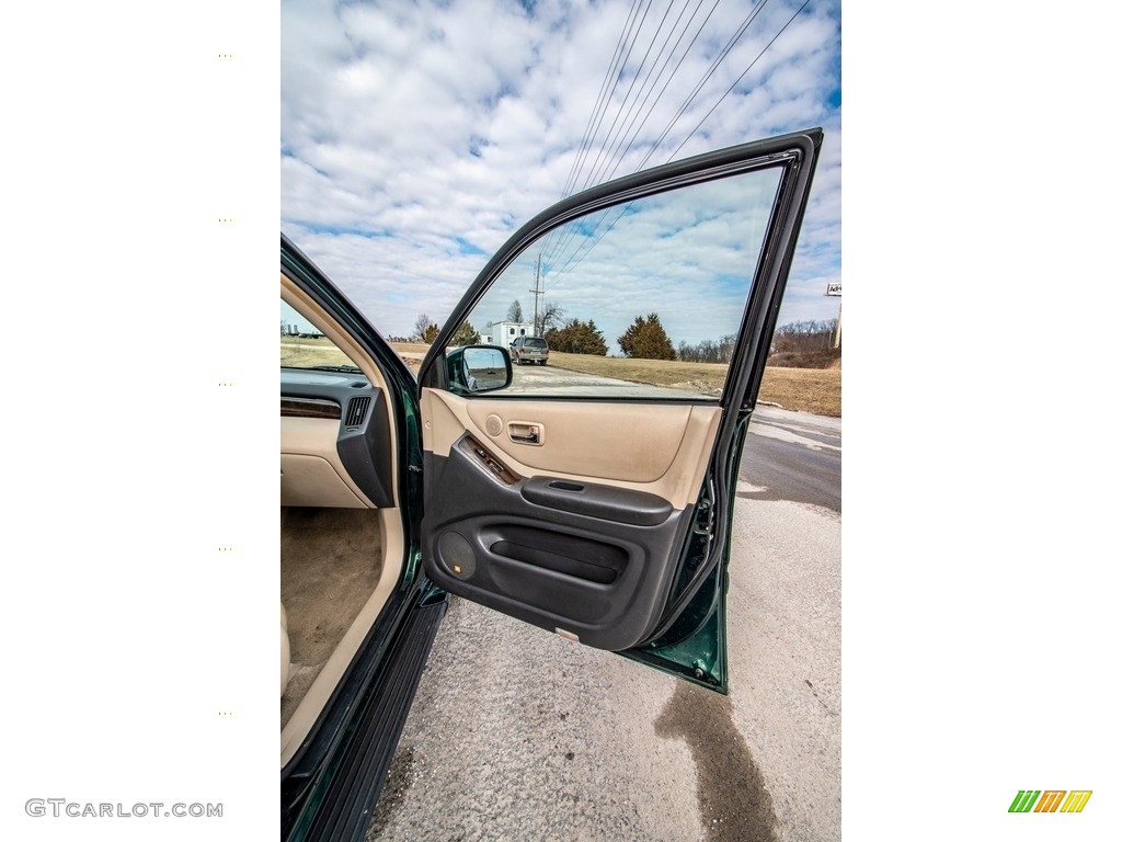 2002 Highlander V6 4WD - Electric Green Mica / Ivory photo #28