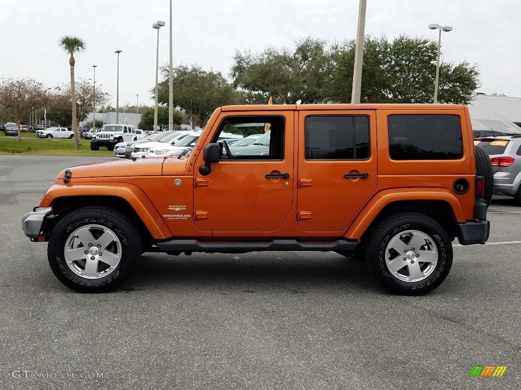 2011 Wrangler Unlimited Sahara 4x4 - Mango Tango Pearl / Black/Dark Saddle photo #2