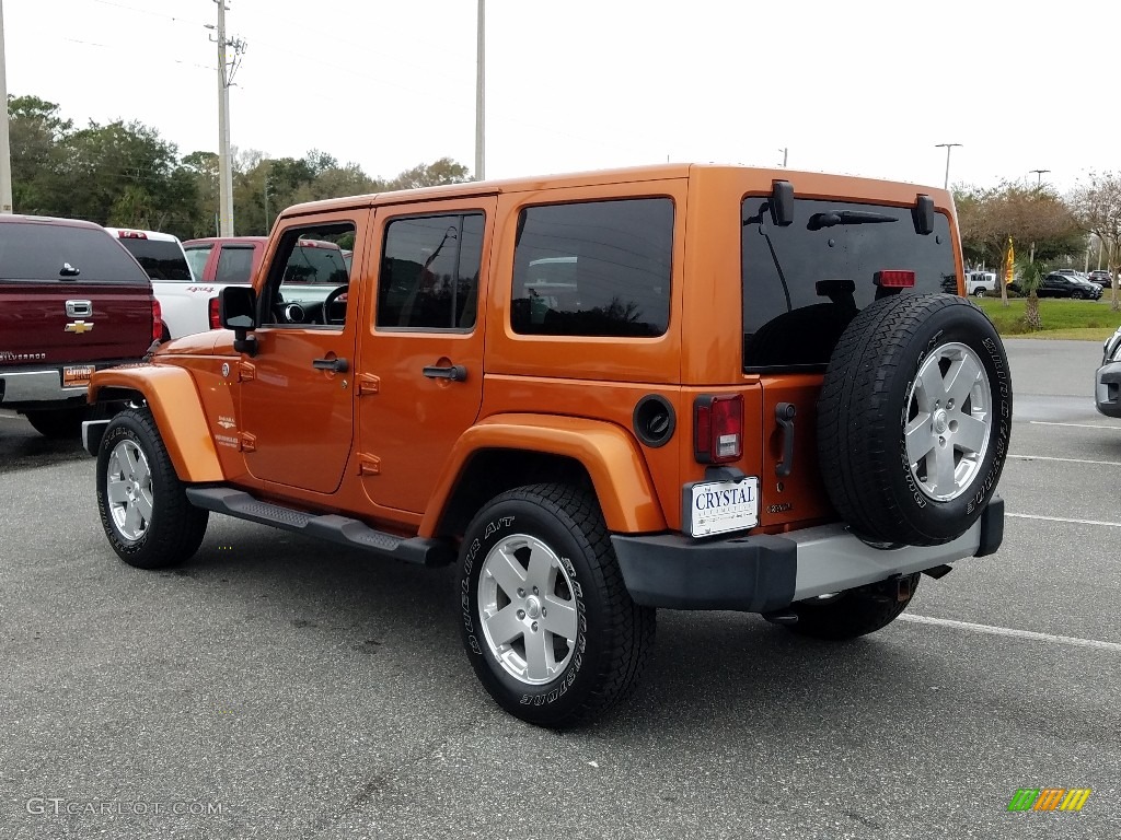 2011 Wrangler Unlimited Sahara 4x4 - Mango Tango Pearl / Black/Dark Saddle photo #3